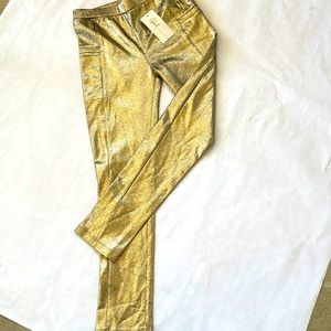 Gold and black peel kids leggings never worn and a great material